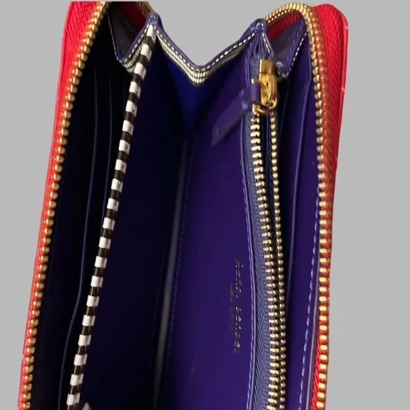 Henri Bendel red quilted wallet with a gold-tone logo. - Picture 14 of 16